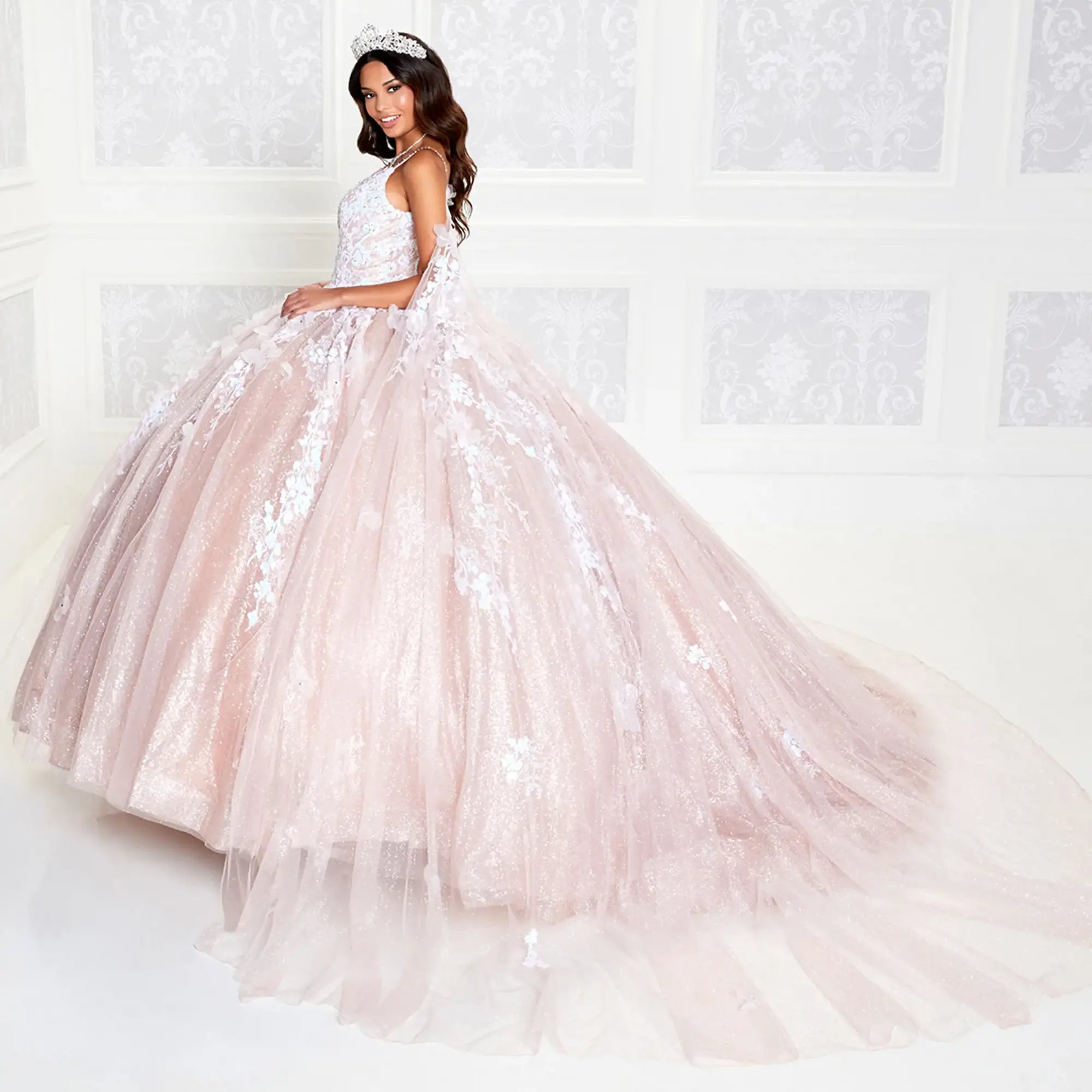 Shimmering tulle quinceanera dress with floral applique and detachable cape