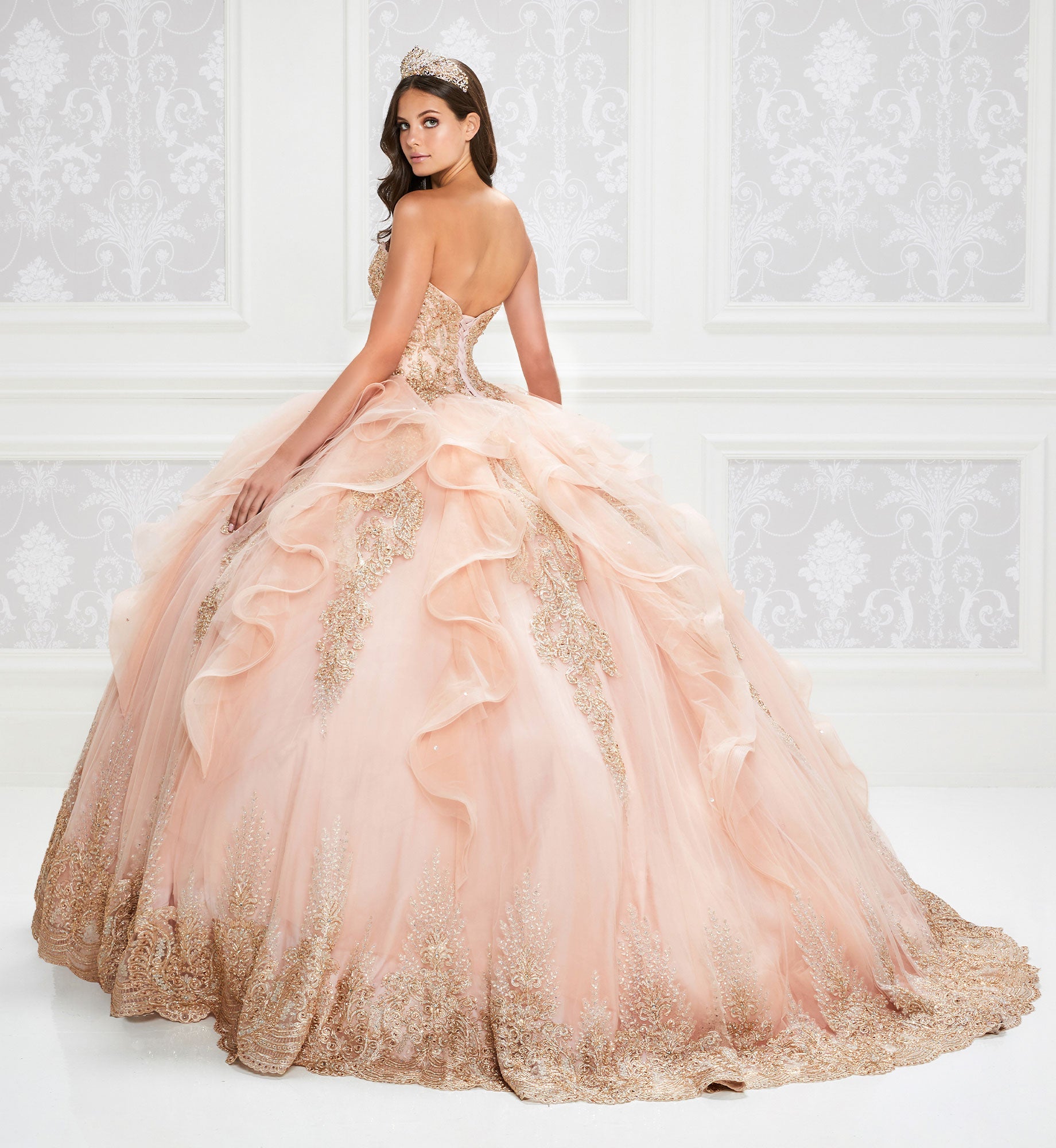 Strapless quinceaneara dress with gold lace and ruffled skirt