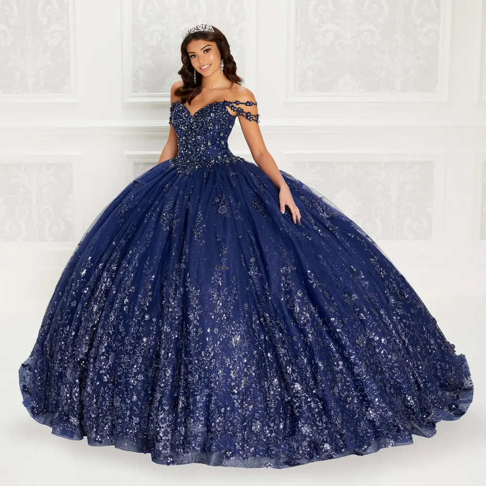 Quinceanera dress with beaded bodice and floral applique details along the hem