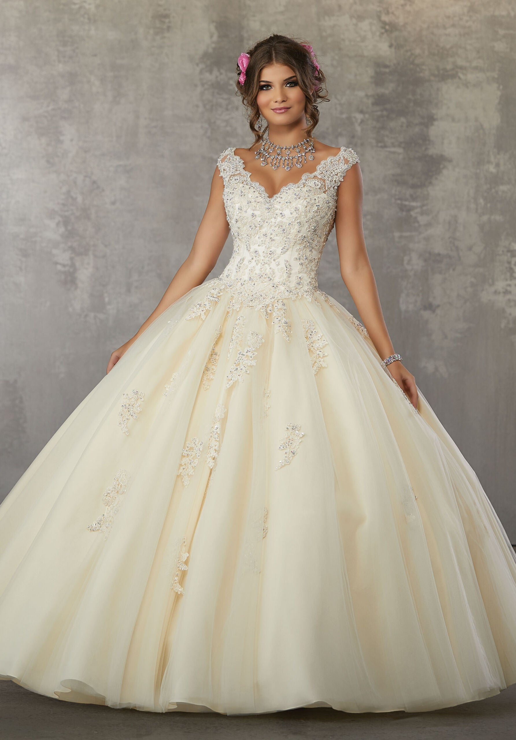 Crystal Beaded Lace Appliqus on a Tulle Ball Gown Elegant Bride and Quinceanera Crystal Beaded Lace Appliqus on a Tulle Ball Gown Elegant Bride and Quinceanera